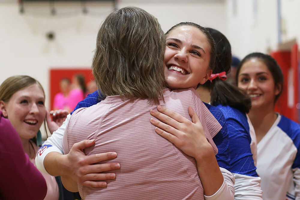 Bindi Hill hugs assistant coach Val Streeter
